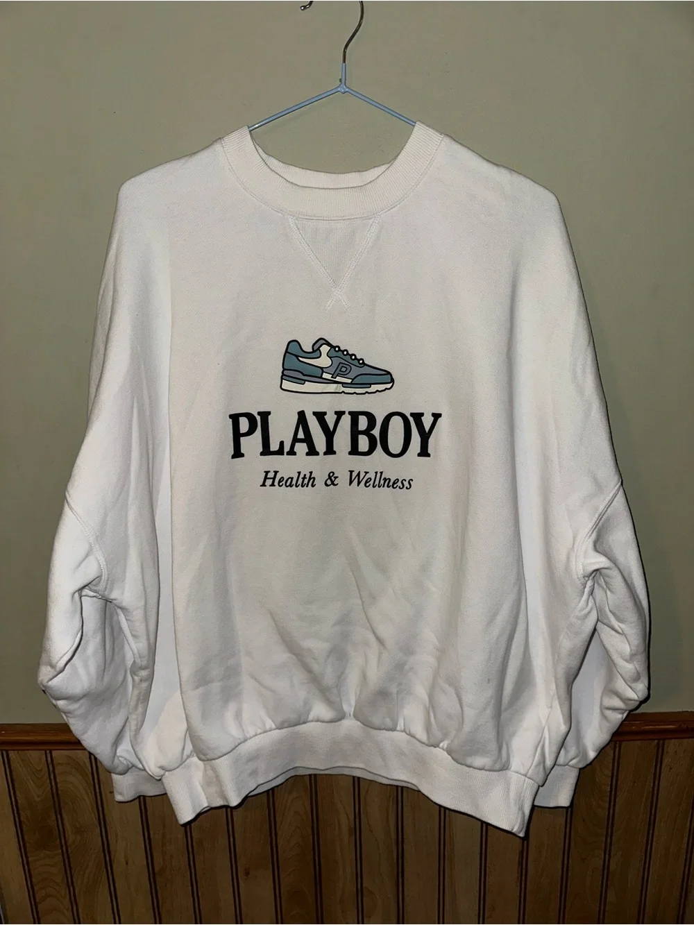 PLAYBOY White Crewneck Sweatshirt with Blue Sneaker Graphic